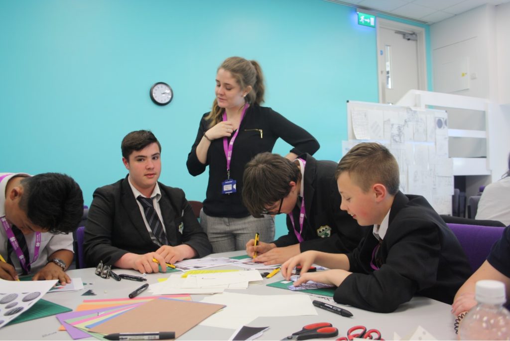 Students working within a classroom